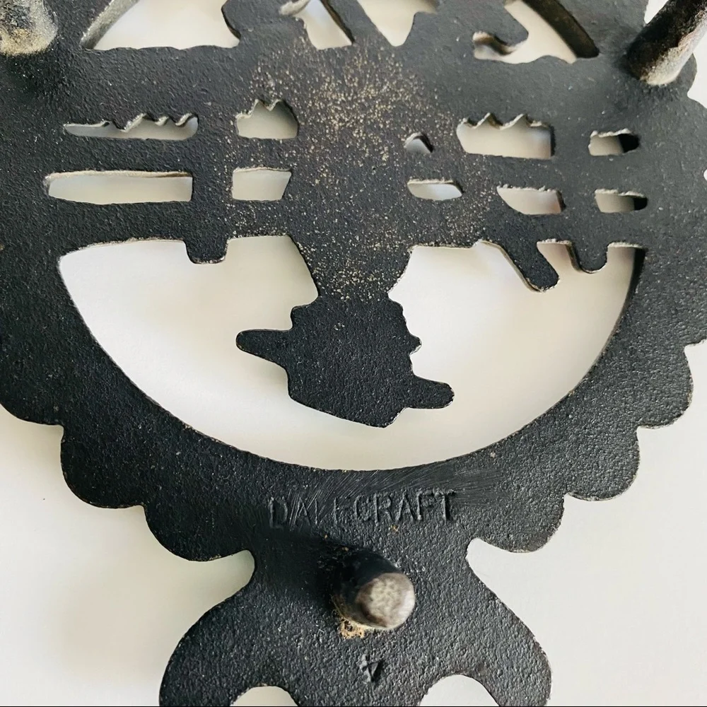 Vintage  Cast Iron Amish Woman and  man Trivets.